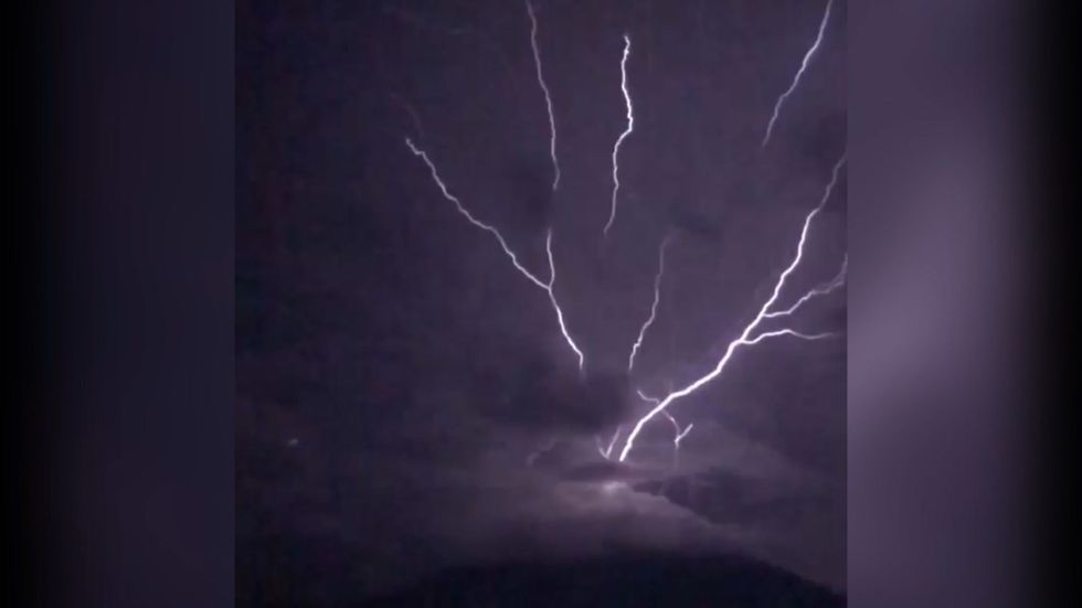 Lightning strikes upwards on Guatemala mountain
