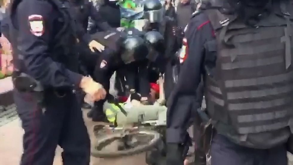 Police arrest and beat opposition protesters in Moscow