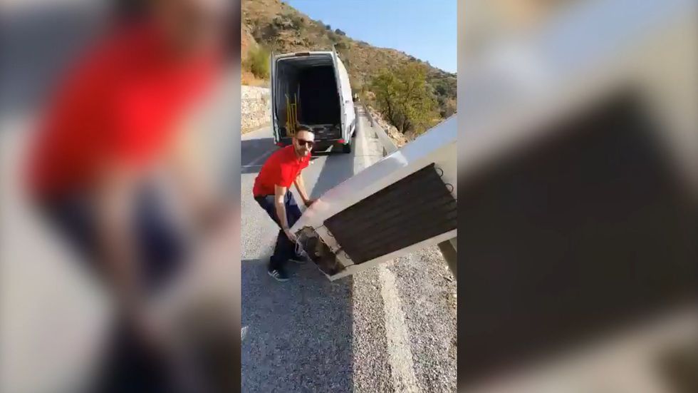 Man forced to haul back fridge he threw over cliff in Spain