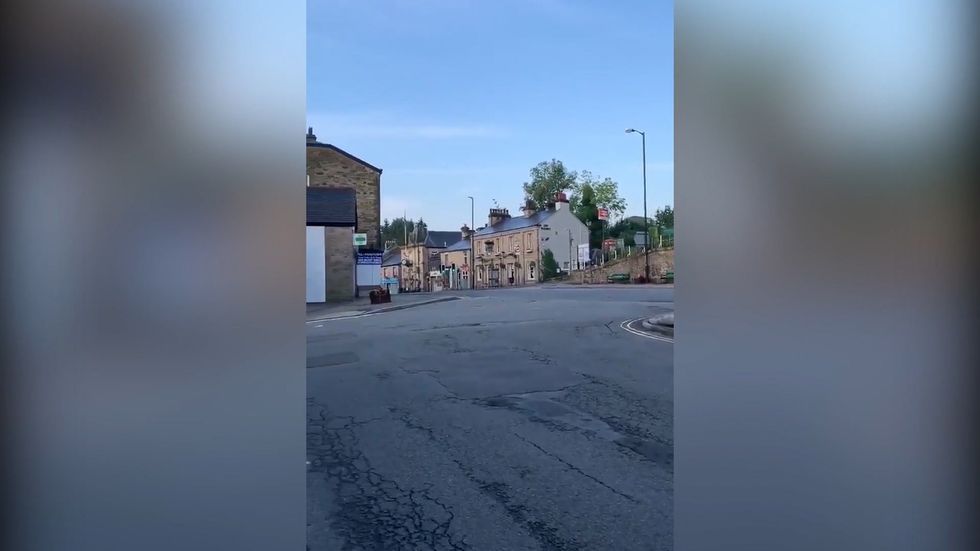 Resident walks around 'eerie' Whaley Bridge after village evacuated due to floods