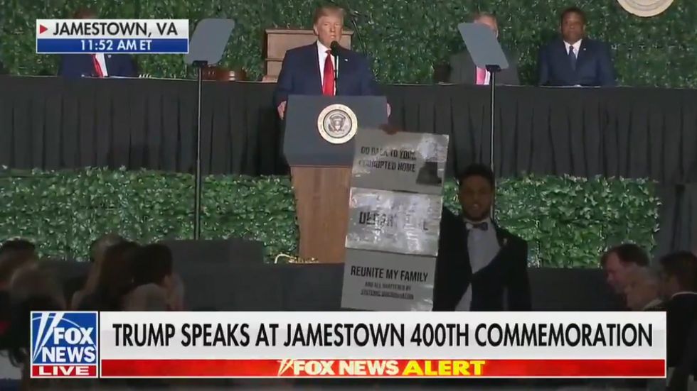 Protester calls out Donald Trump as he is speaking in Virginia