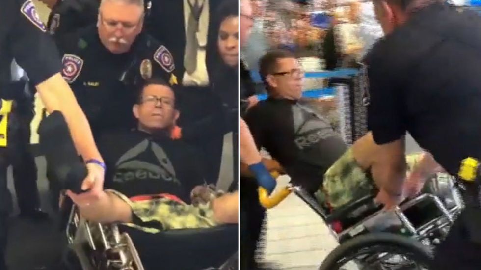 Man dragged off American Airlines flight in wheelchair