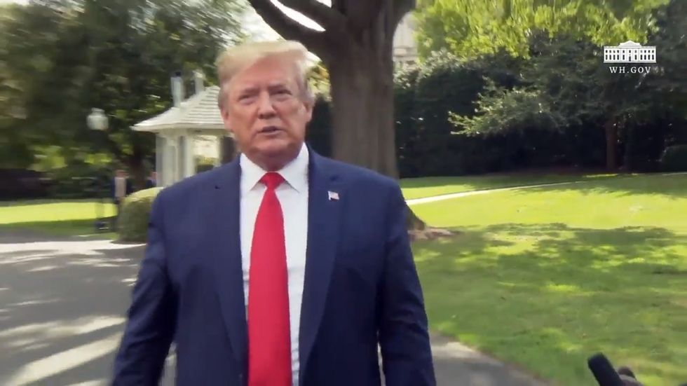 Trump berates reporters for asking him about being indicted