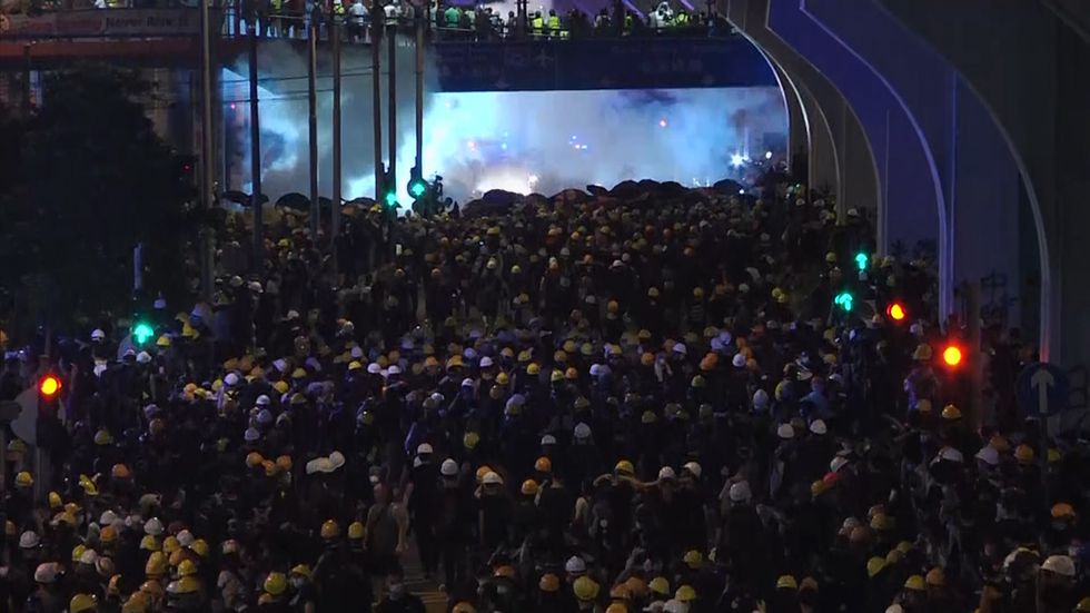 Police fire tear gas at protesters in Hong Kong