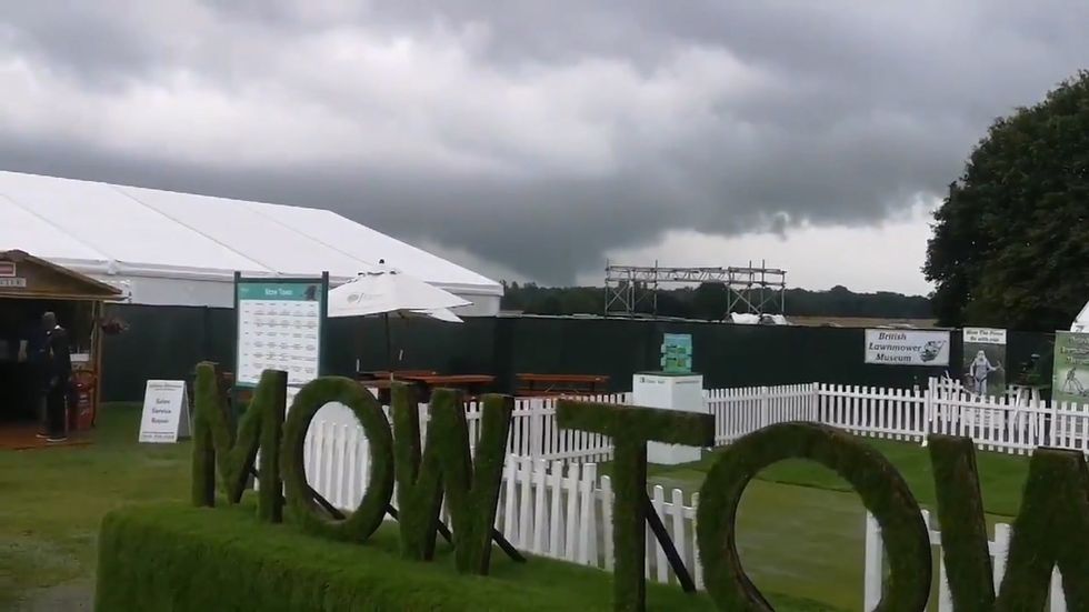 Tornado near Manchester damages cars and roofs