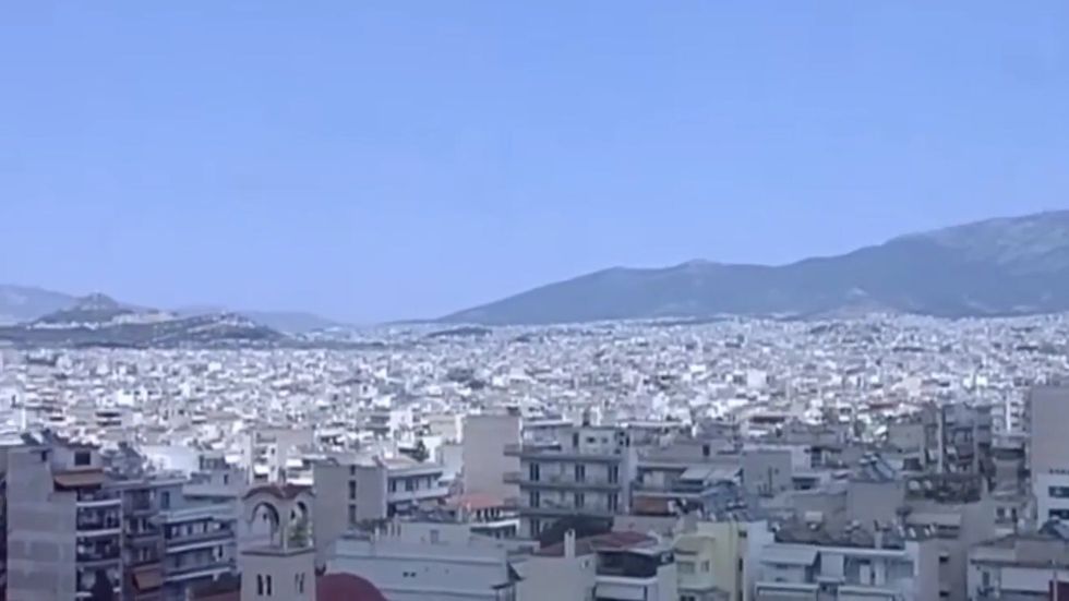 People flee into streets after strong earthquake in Athens