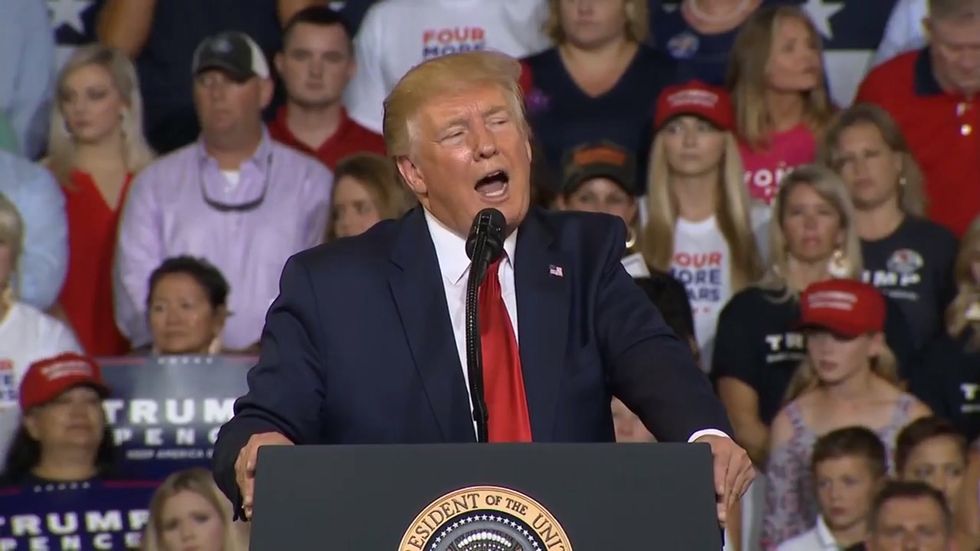 Trump supporters chant 'send her back' after president attacks Ilhan Omar