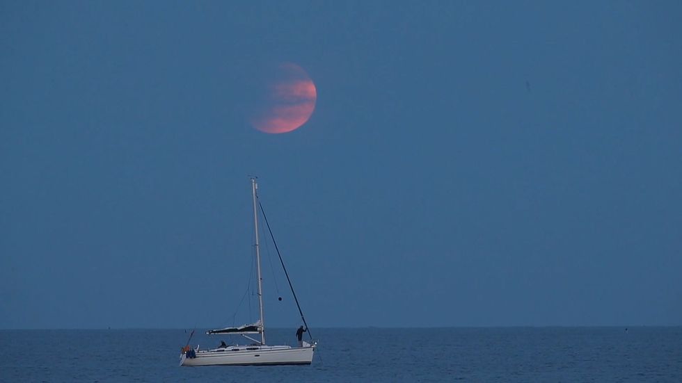 Partial lunar eclipse in Dorset on 50th anniversary of Apollo 11 launching on its moon mission