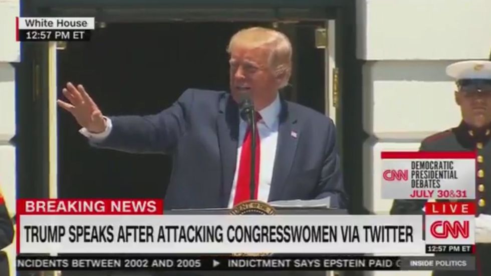 Donald Trump shouts 'quiet' at a reporter six times for challenging him on his racist tweets