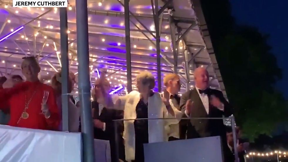 Theresa May dances to Dancing Queen at Henley Festival