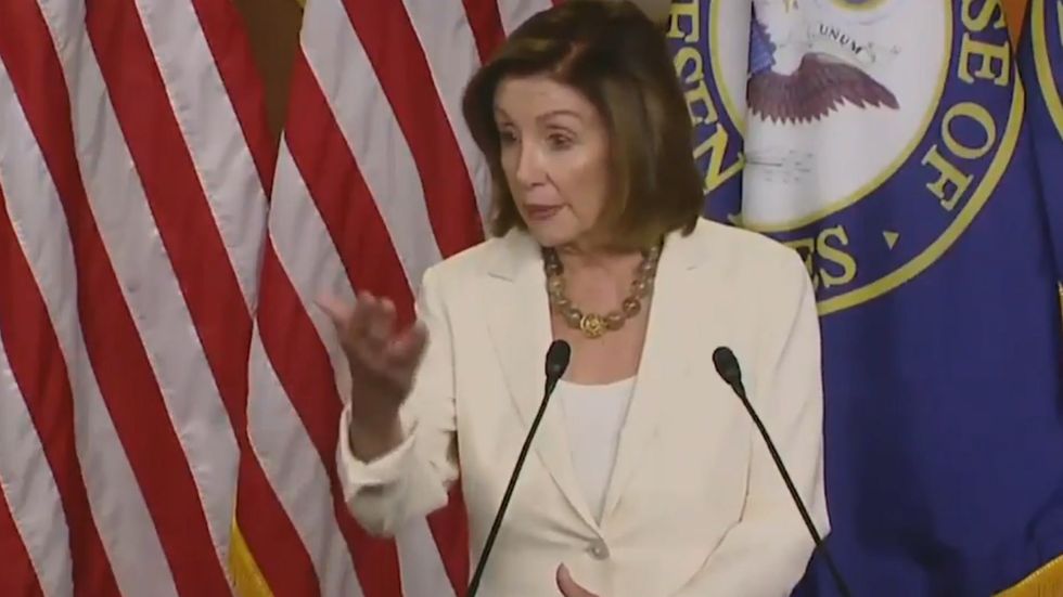 Pelosi snaps at reporter over AOC feud about 'singling out women of colour'