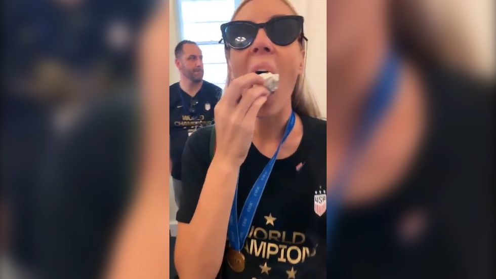 Women's US football team use gender discrimination lawsuit as confetti