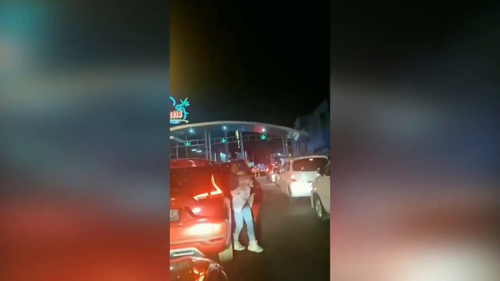 Traffic builds up in Manado, Indonesia as residents panic over tsunami warning