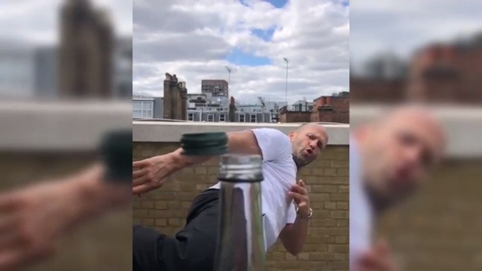 Jason Statham performs the 'bottle cap challenge'