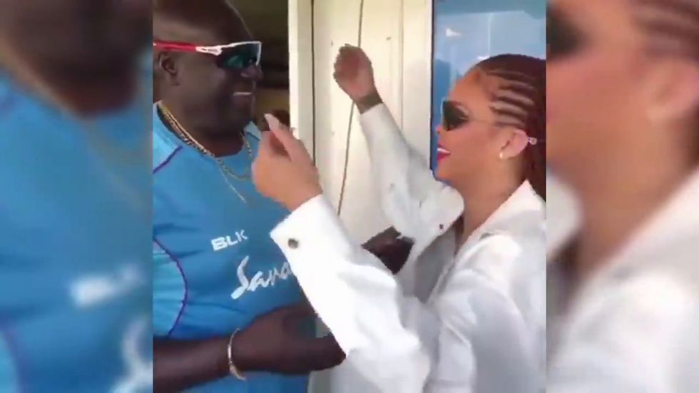 Rihanna reunites with her school PE teacher during Cricket World Cup