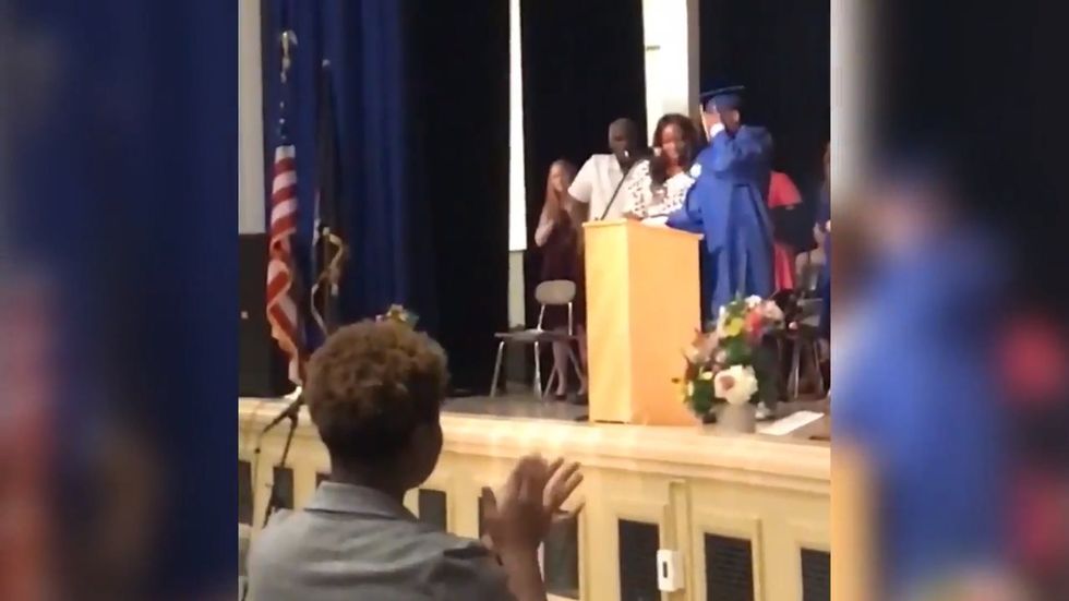 Valedictorian comes out as bisexual during ceremony speech as crowd gives standing ovation