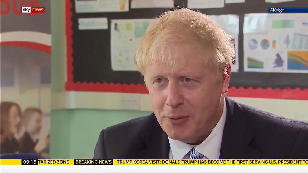 Boris Johnson says 'watermelon smiles' remark was 'wholly satirical'