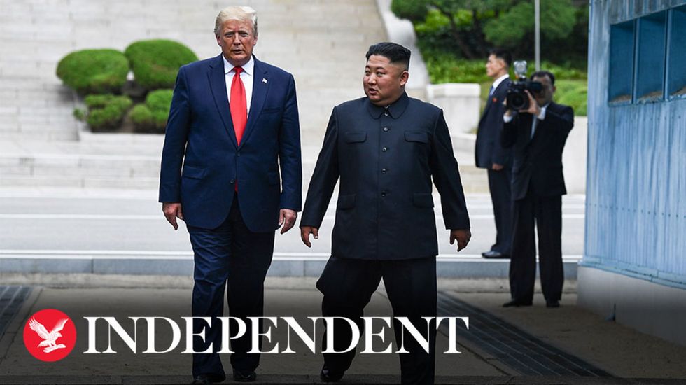 Trump becomes first sitting US president to set foot in North Korea at meeting with Kim Jong-un