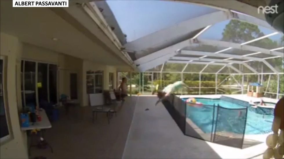 Father jumps over fence to save one-year-old son from drowning