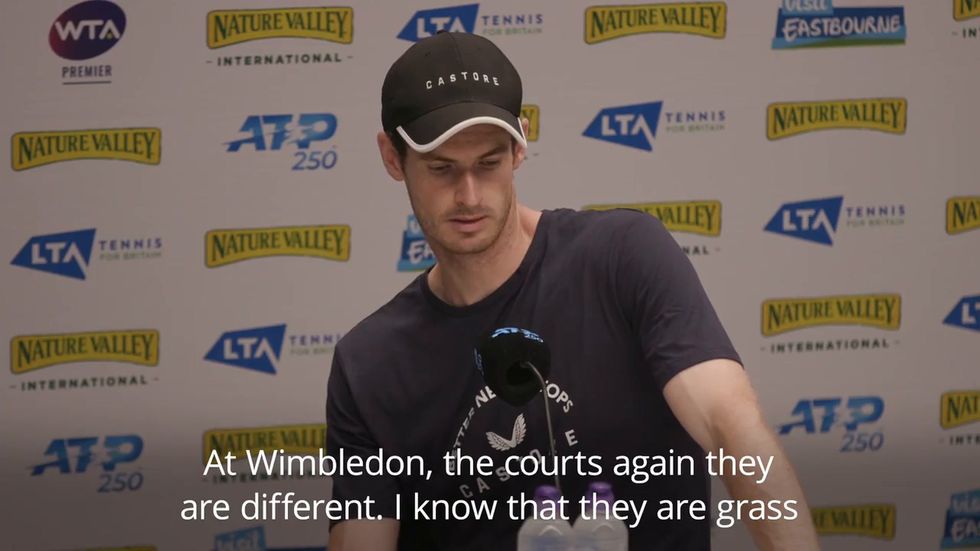 Andy Murray reacts to Eastbourne doubles defeat