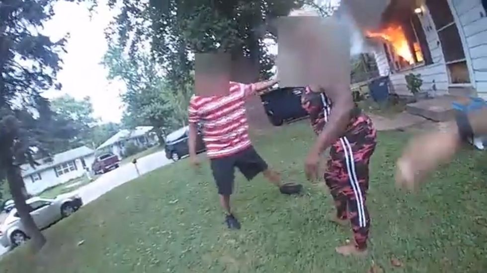 Three-year-old and grandmother rescued from burning home by police officer