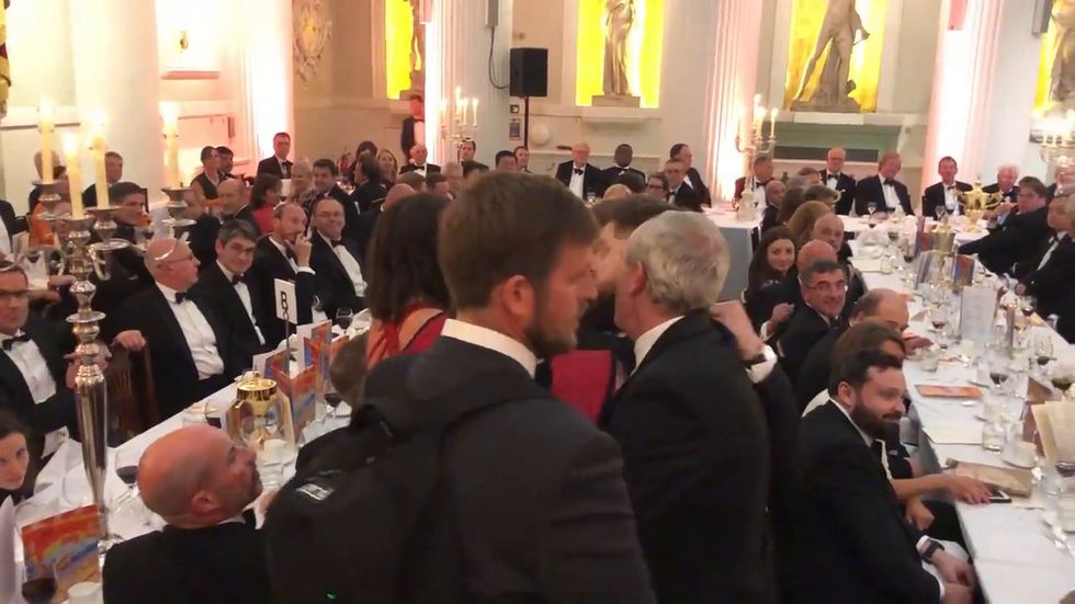 Climate protesters interrupt Philip Hammond speech at Mansion House