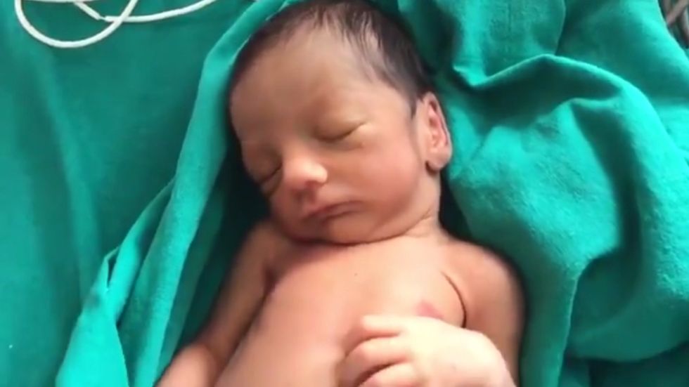 Footage shows newborn baby girl Pihu who two journalists are trying to adopt 