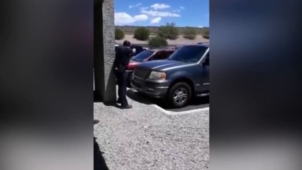 Phoenix police officer pulls gun on black family and warns he'll 'shoot them in the face'