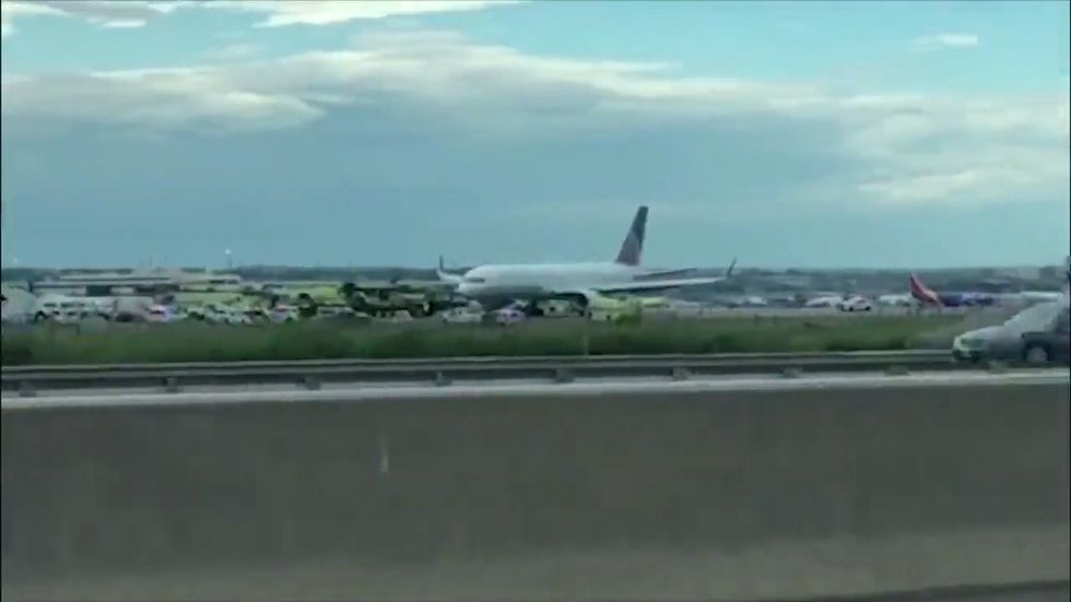 Passengers met by emergency services after United Airlines plane skids off runway on landing in New York