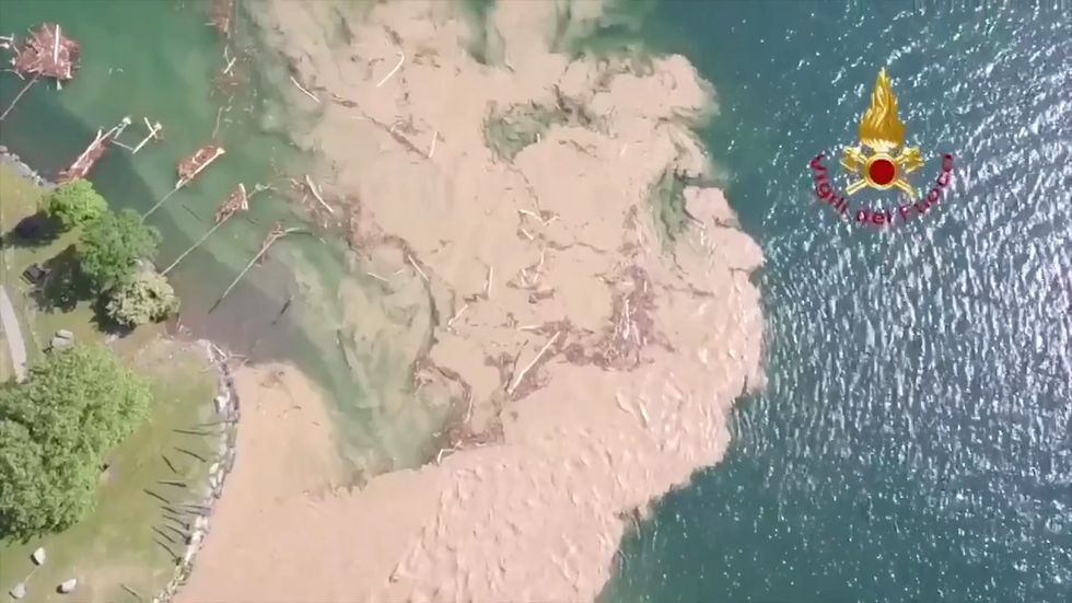Mudslides pour into Lake Como after severe flooding in Italy