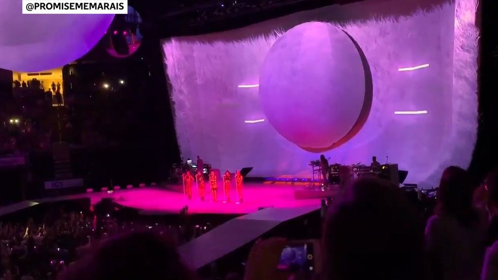 Ariana Grande cries as she performs in Mac Miller's hometown