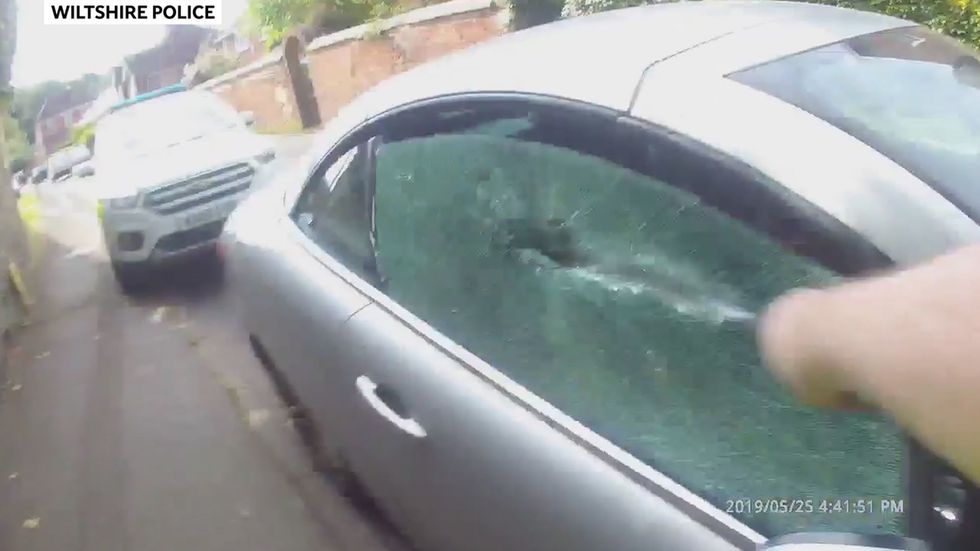 Dog rescued from hot car by police officer in Wiltshire