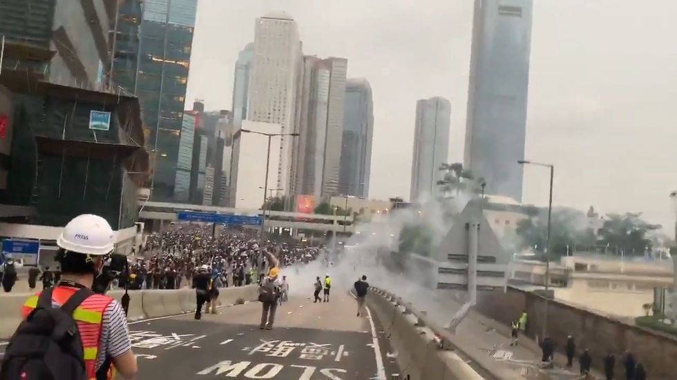 Hong kong police attack journalists: 'You're shooting at the press'