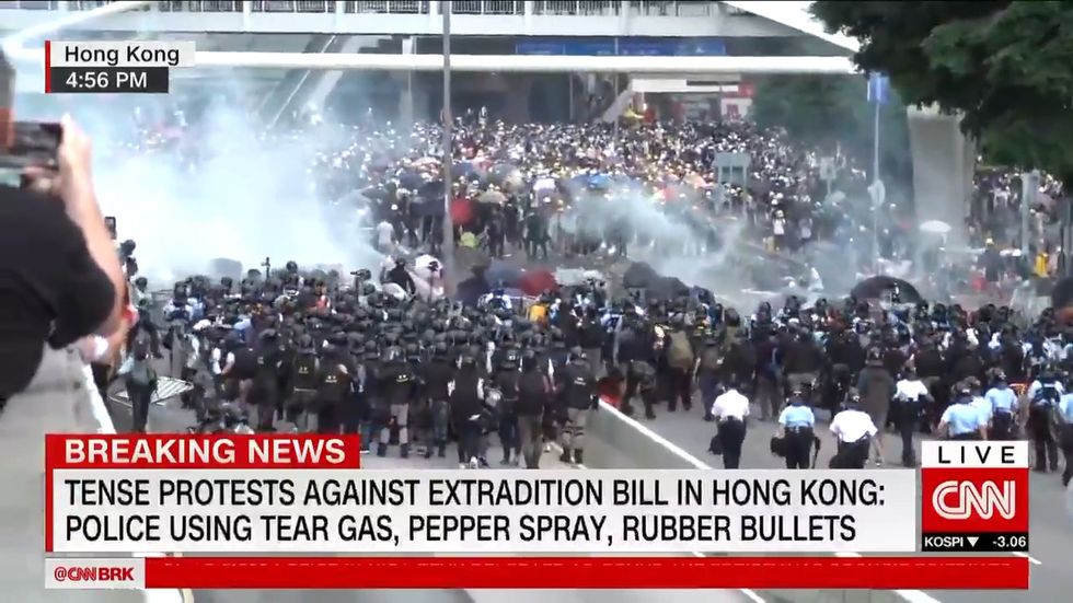 Tear gas fired at Hong Kong protesters
