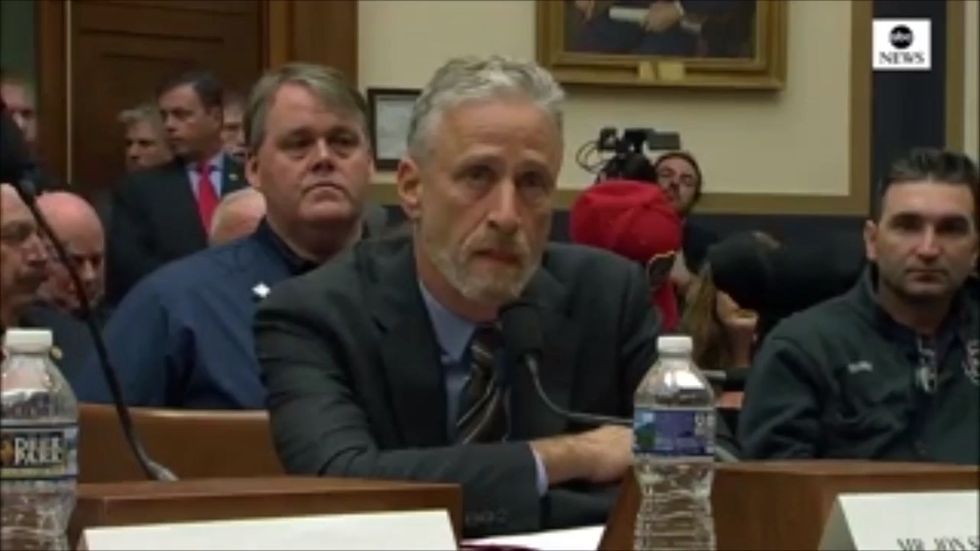 Jon Stewart receives standing ovation after blasting US congress for 'empty' 9/11 victims hearing