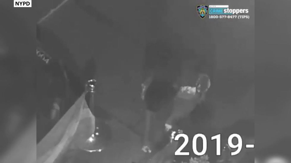 Police release CCTV of man burning LGBT flags in front of New York nightclub