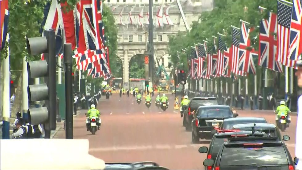 Trump's motorcade drives down an empty Mall in London towards Buckingham Palace