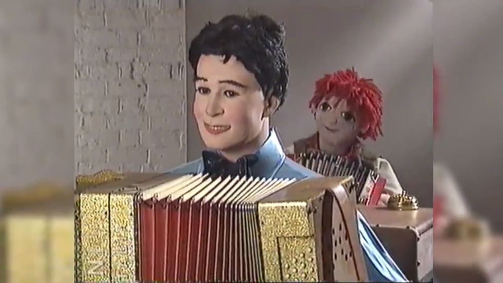 Clip from 1991 Rosie and Jim episode shows robot accordion player