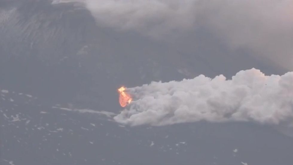 Mount Etna spews lava and ash in spectacular eruption