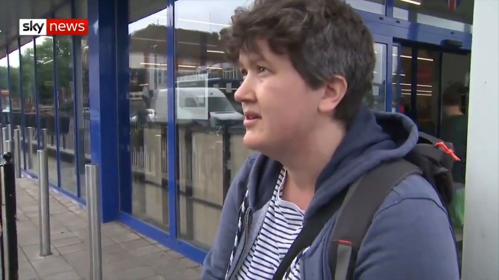 Gay mother Katy Bennett talks with Muslim protest leader Shakeel Afsar in Birmingham about why children should know LGBT families exist