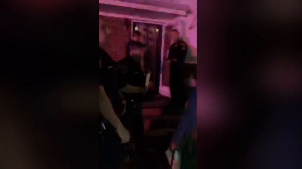 Police raid black woman's house after 'playing Malcolm X speech too loudly' in North Carolina