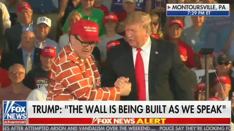 Donald Trump invites man wearing 'wall suit' on stage at Pennsylvania rally