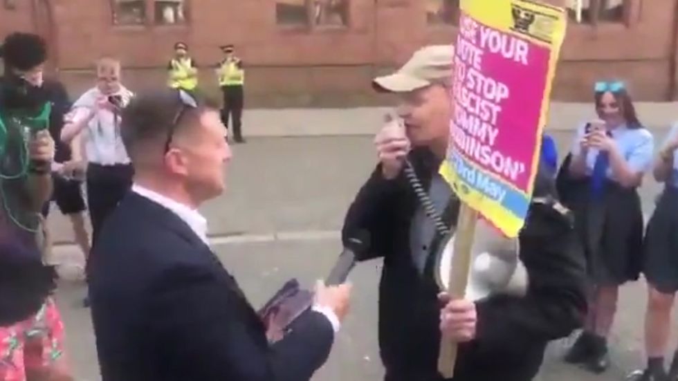 Stand Up to Racism activists in Barrow-on-Furness call out Tommy Robinson: 'Tommy is a nazi'