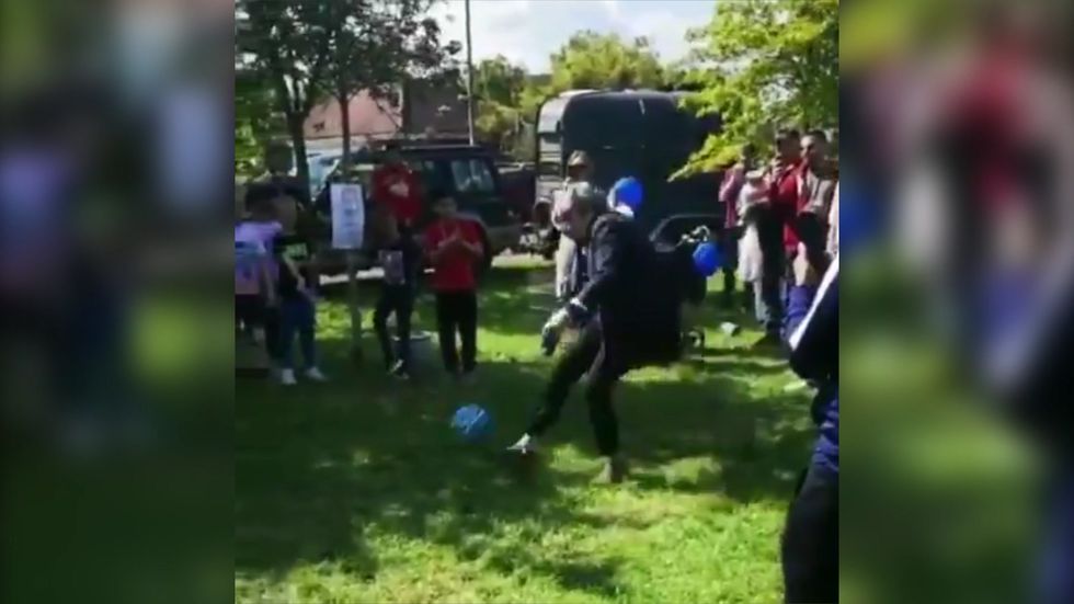 Theresa May plays football in Maidenhead constituency