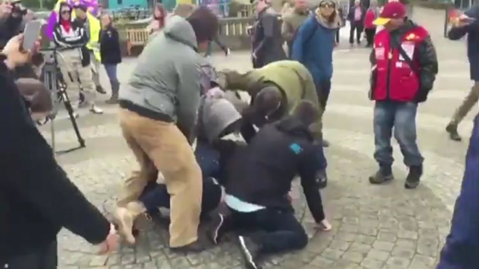 Fight breaks out in Truro after protesters try to throw a milkshake at UKIP MEP candidate Carl Benjamin