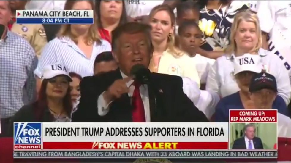 Donald Trump laughs at Florida rally as supporter suggests shooting immigrants