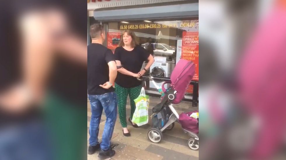 Tommy Robinson told he is 'spouting any old sh**e' whilst campaigning on Salford street