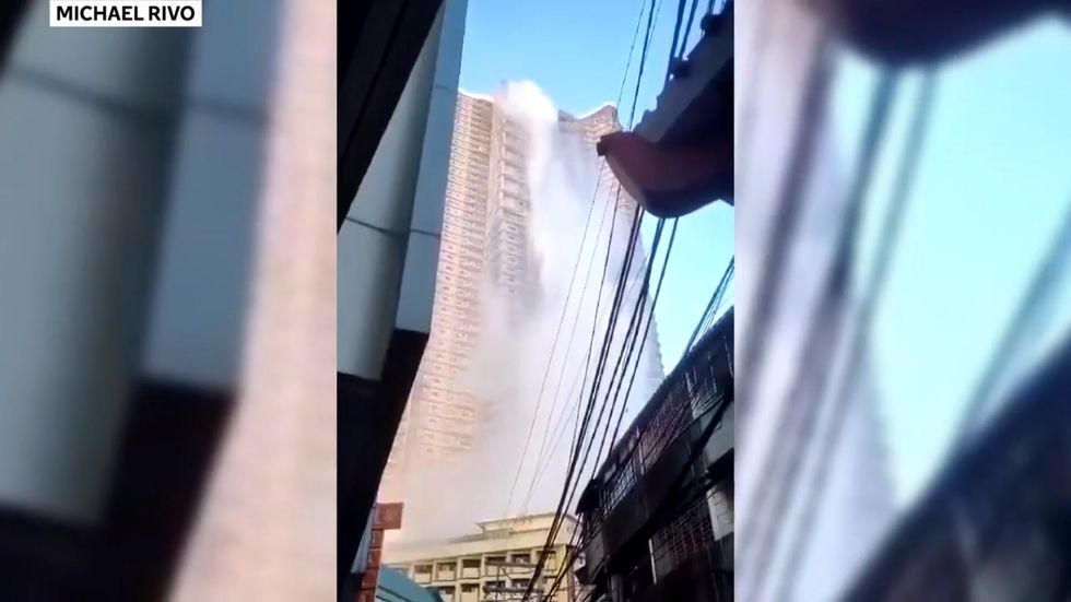 Philippines earthquake causes rooftop swimming pool to pour down skyscraper