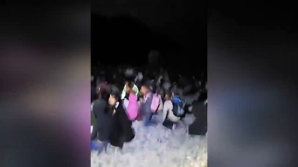 Armed vigilantes 'illegally' detain hundreds of migrants on US border