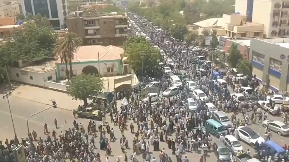 Protesters in Sudan rejoice after officials say al Bashir has quit